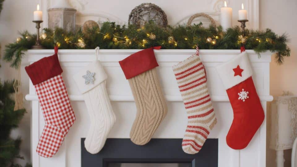 display stockings as textured mantel art