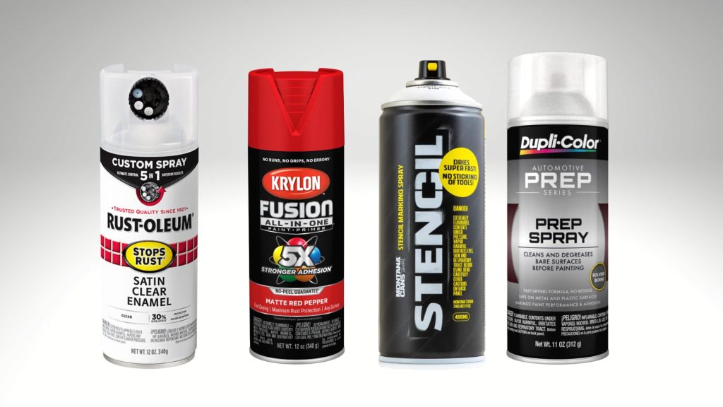 Four spray paint cans displayed side by side against a light background, including Rust-Oleum Satin Clear Enamel, Krylon Fusion All-In-One, Montana Gold stencil spray, and Dupli-Color Prep Spray automotive surface cleaner