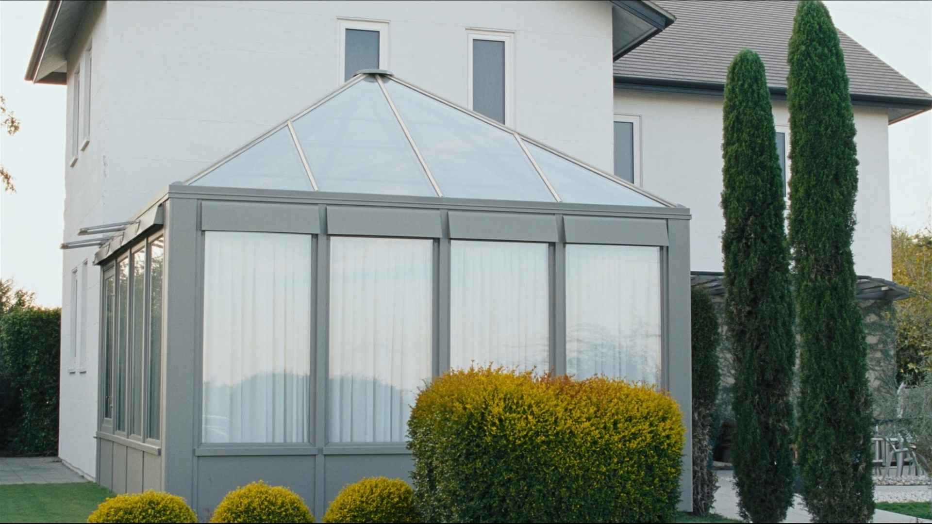 Professional architectural plans for a glass-roofed conservatory extension highlighting the new 10-year planning rule.