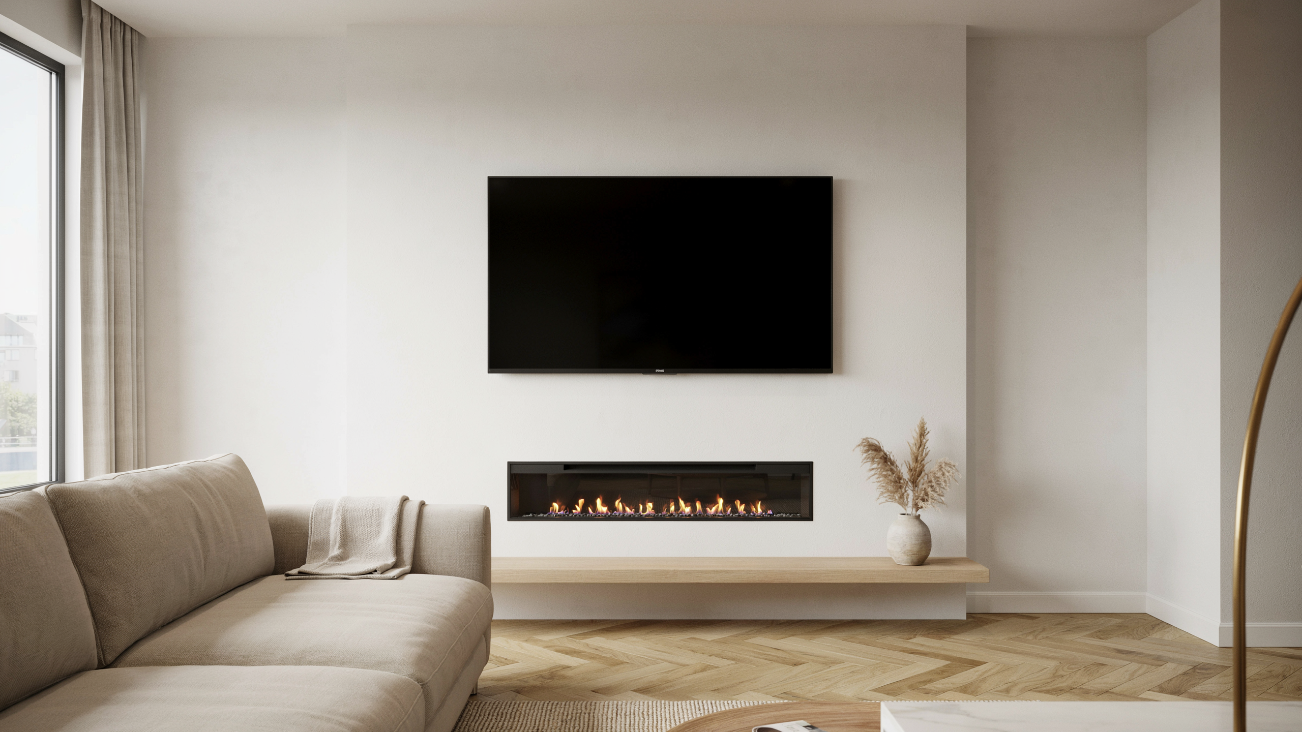 Recessed linear electric fire with flush-mounted TV above on a smooth white media wall in a living room