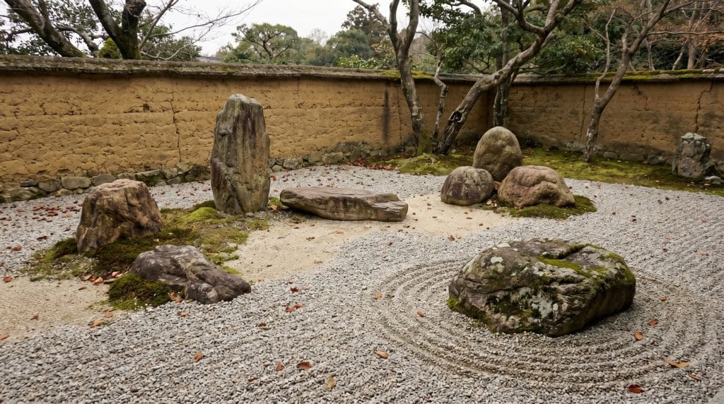 Traditional Zen garden enclosed by earthen walls with carefully placed rocks, moss patches, and curved gravel designs